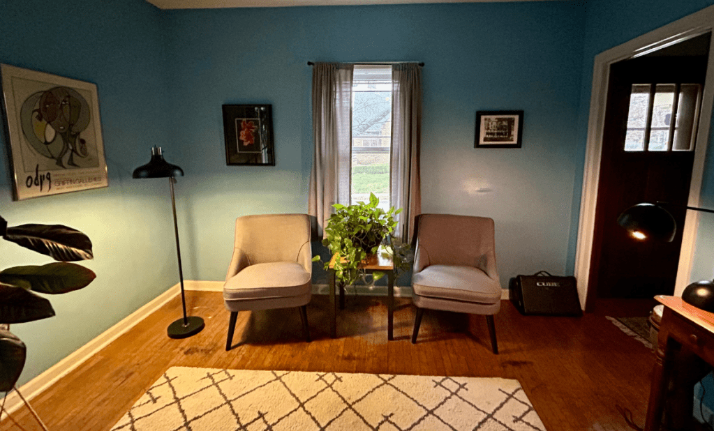 An office with two chairs and soft lighting. Comfortable place to receive mental health counseling